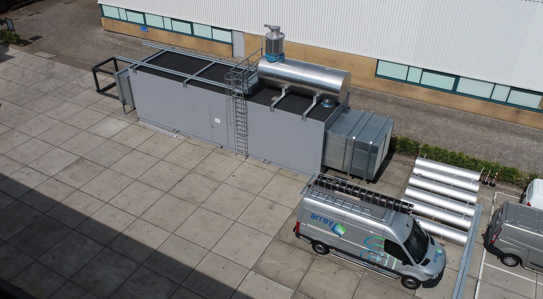 photo is a truck loaded with the components of the balance of plant